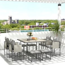 outdoor patio with dining table and chairs