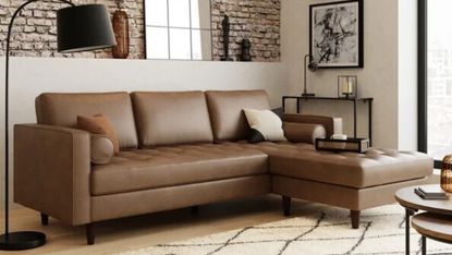 dunelm sofa against brick wall