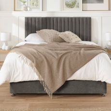 White divan bed and dark grey bed frame